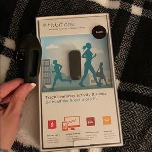 Fitbit one wireless tracker new in open box
